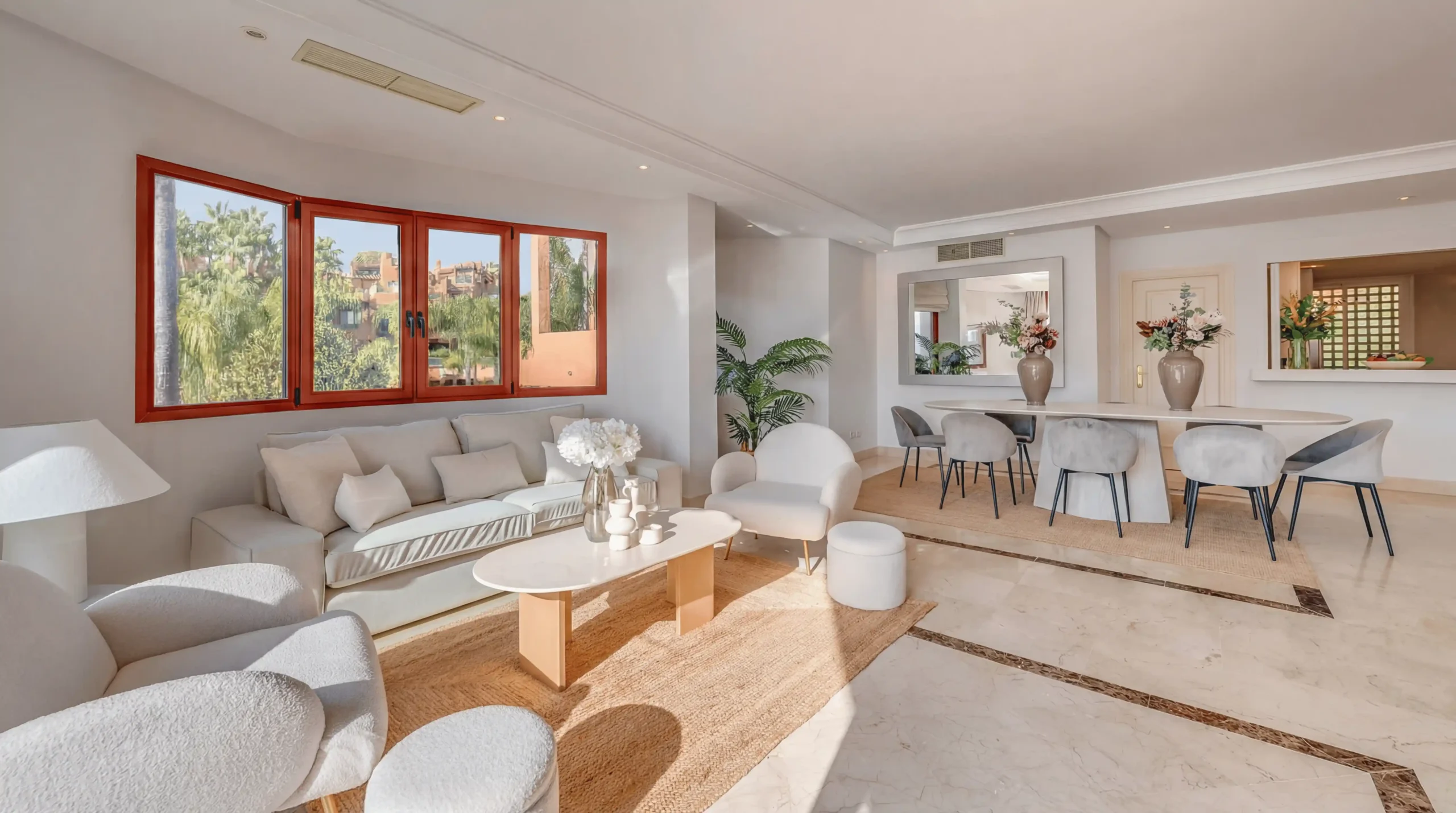 Luxury duplex penthouse in Nueva Andalucía Marbella with panoramic sea views, giant rooftop terrace, BBQ area, outdoor dining, and walking distance to Puerto Banús beach and marina.