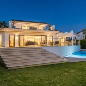 Luxury villa rental in Marbella Nueva Andalucía with heated private pool, panoramic sea views, golf valley location, modern Mediterranean architecture, luxury holiday home near Puerto Banús