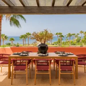 Luxury beachfront penthouse in Estepona Marbella with panoramic sea views, private heated jacuzzi, luxury terrace, modern interior, sauna, swimming pools and Mediterranean coastline views on the Costa del Sol