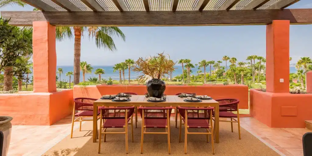 Luxury beachfront penthouse in Estepona Marbella with panoramic sea views, private heated jacuzzi, luxury terrace, modern interior, sauna, swimming pools and Mediterranean coastline views on the Costa del Sol