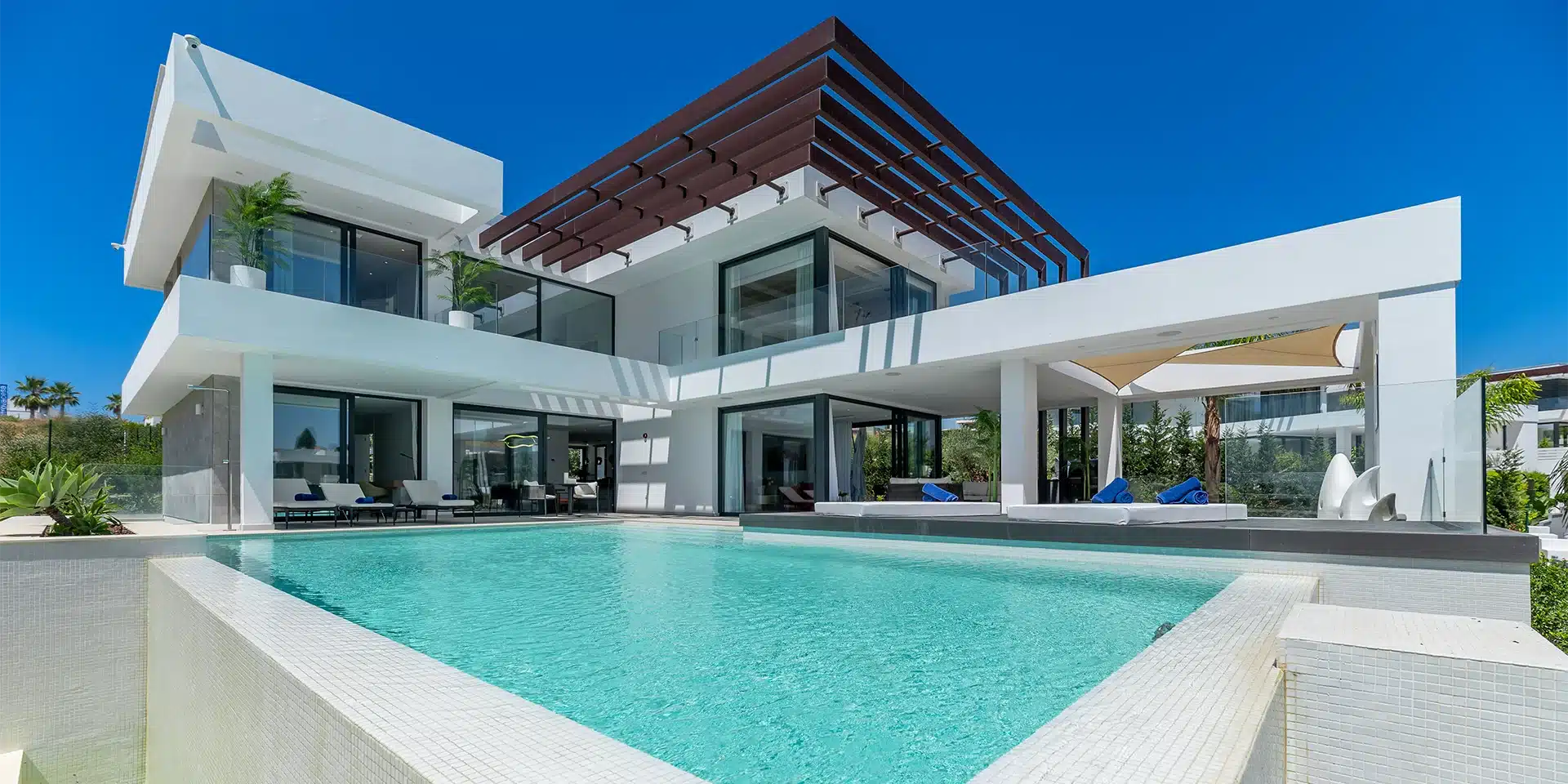 Luxury villa rental in Estepona with heated infinity pool, home cinema room, sea views, private gym, Mediterranean garden and exclusive Costa del Sol holiday accommodation